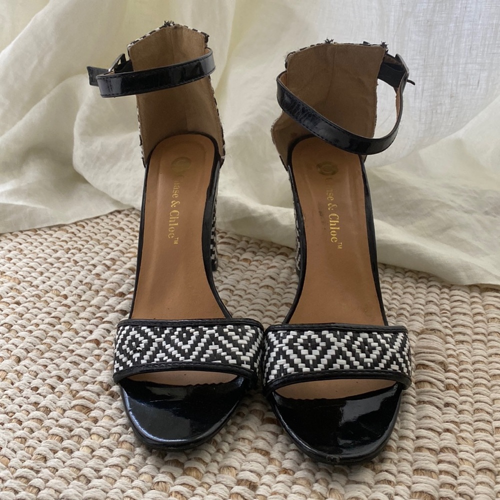 Black and white woven healed sandals